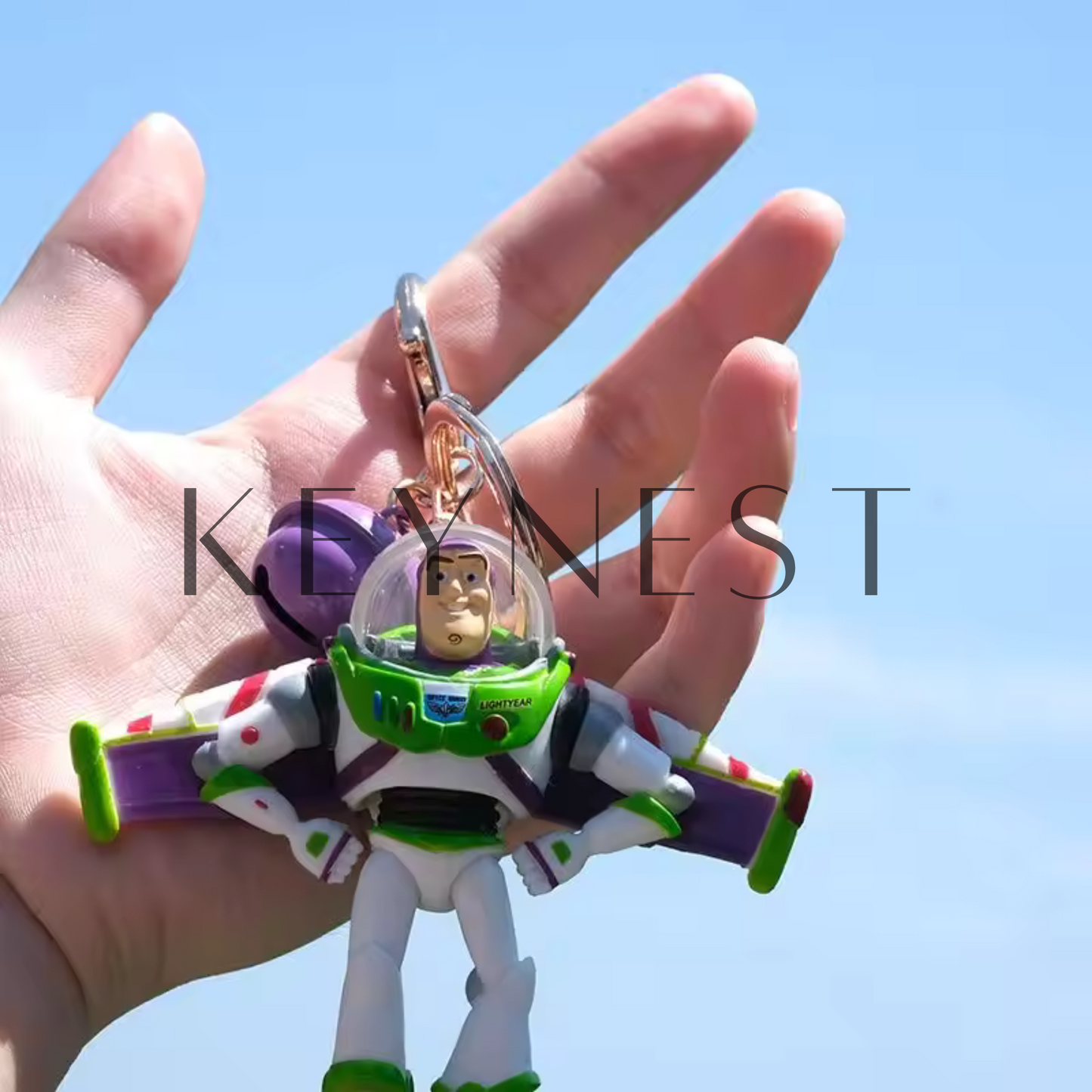 Porte-clé Toy Story – 2 modèles : Buzz l’Éclair & Woody avec clochette 🚀🤠