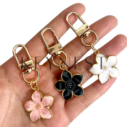 Porte-clé Fleur – 3 coloris élégants : rose, noir ou blanc 🌸🖤🤍