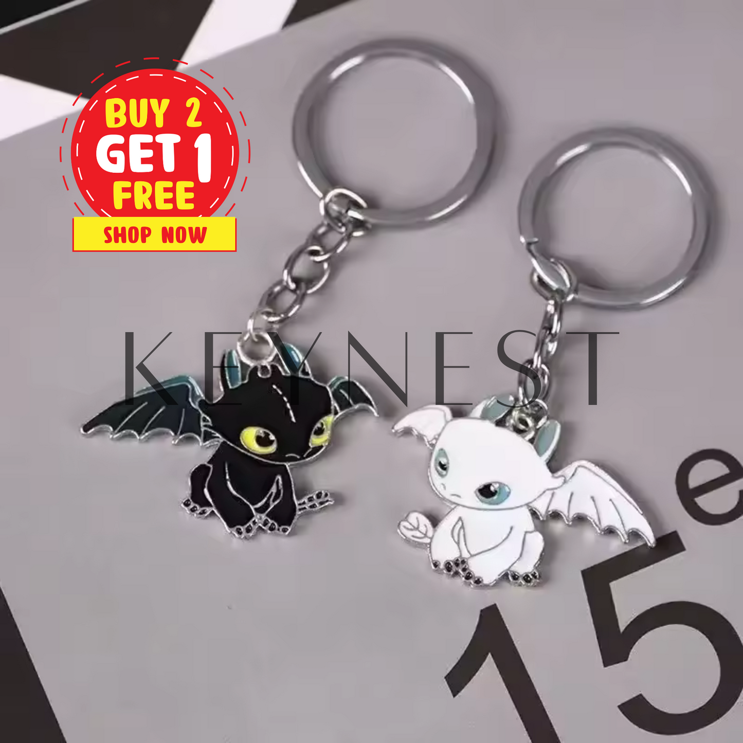 Porte-clé Dragons (2 modèles différents) – Krokmou et Light Fury en argent 🖤🤍