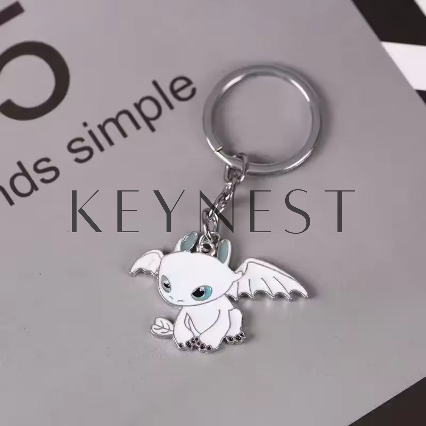 Porte-clé Dragons (2 modèles différents) – Krokmou et Light Fury en argent 🖤🤍