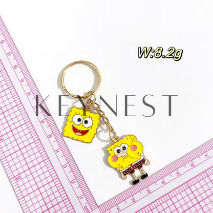 Porte-clé Bob l’Éponge en métal – 4 modèles disponibles pour briller sous la mer 🧽