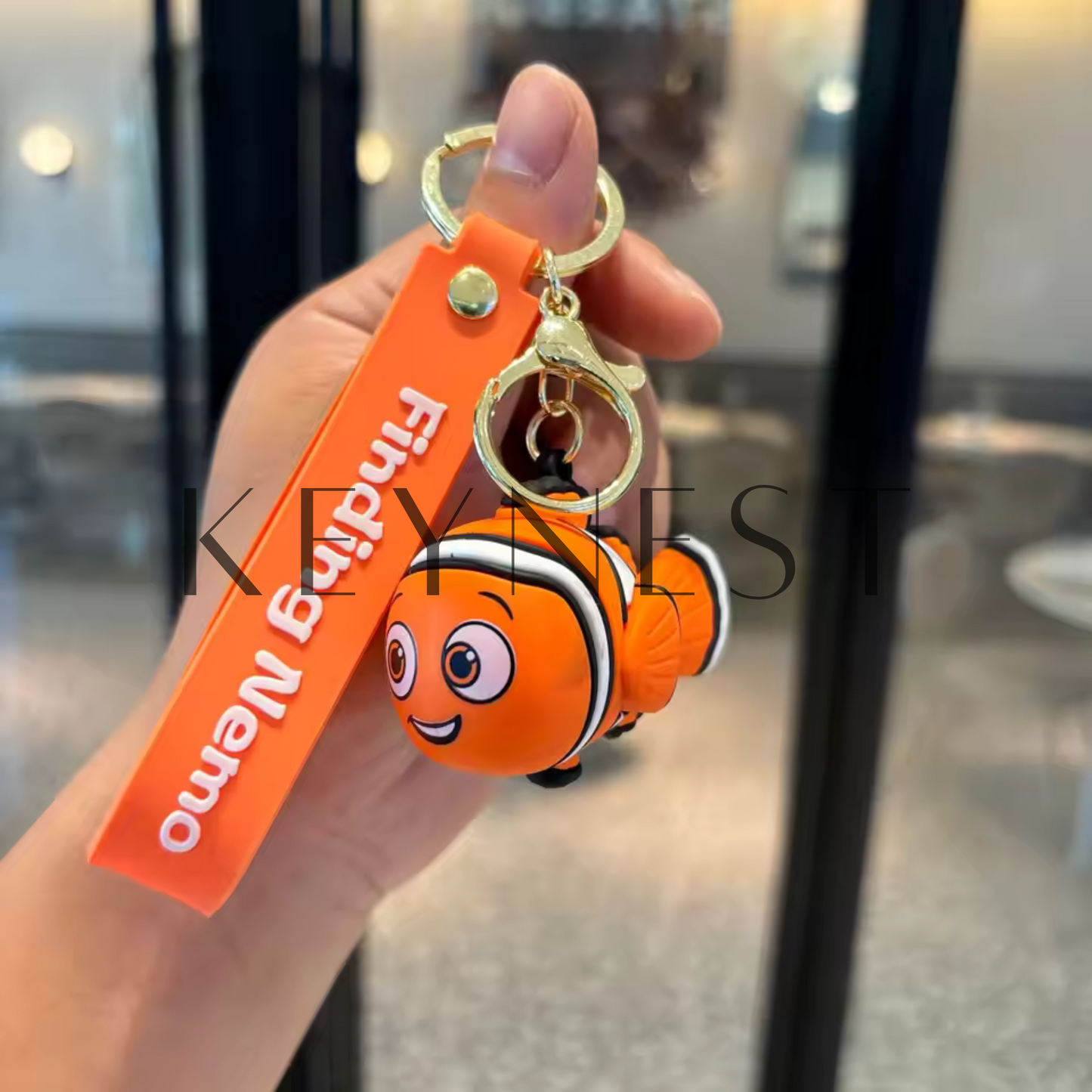 Porte-clé Le Monde de Nemo (2 modèles différents) – Némo et Dory, l'aventure sous-marine à portée de main 🐟