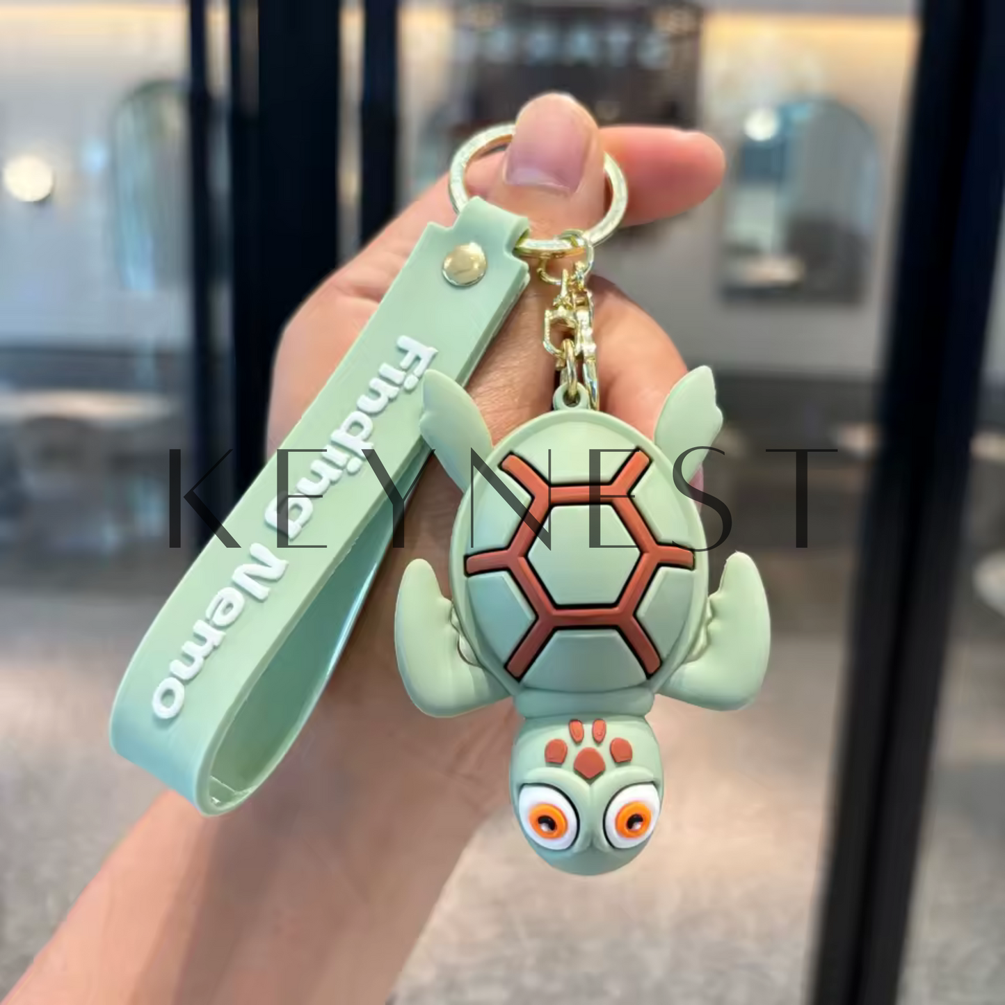 Porte-clé Le Monde de Nemo (2 modèles différents) – Bruce et Crush, les rois de l’océan 🦈🐢