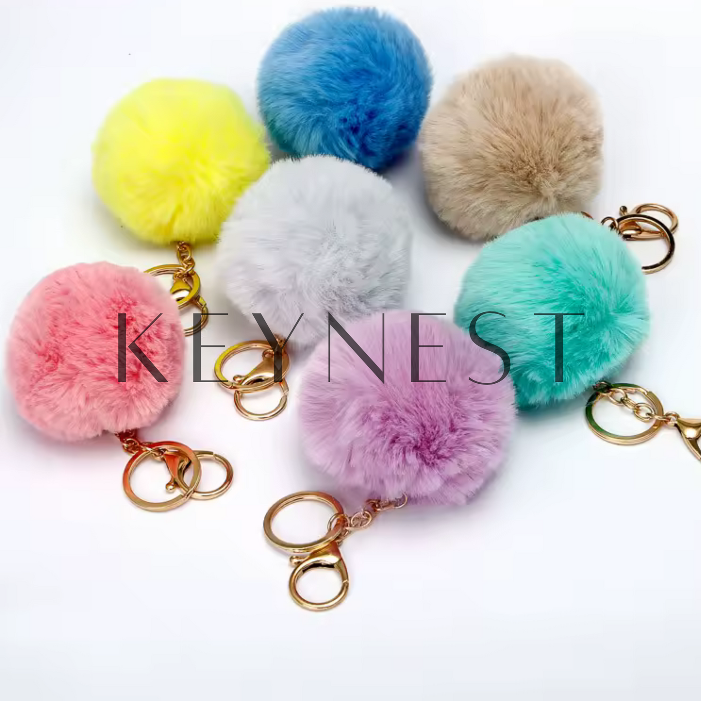 Porte-clé Pompon – 13 coloris pour une touche fluffy au quotidien 🎀✨