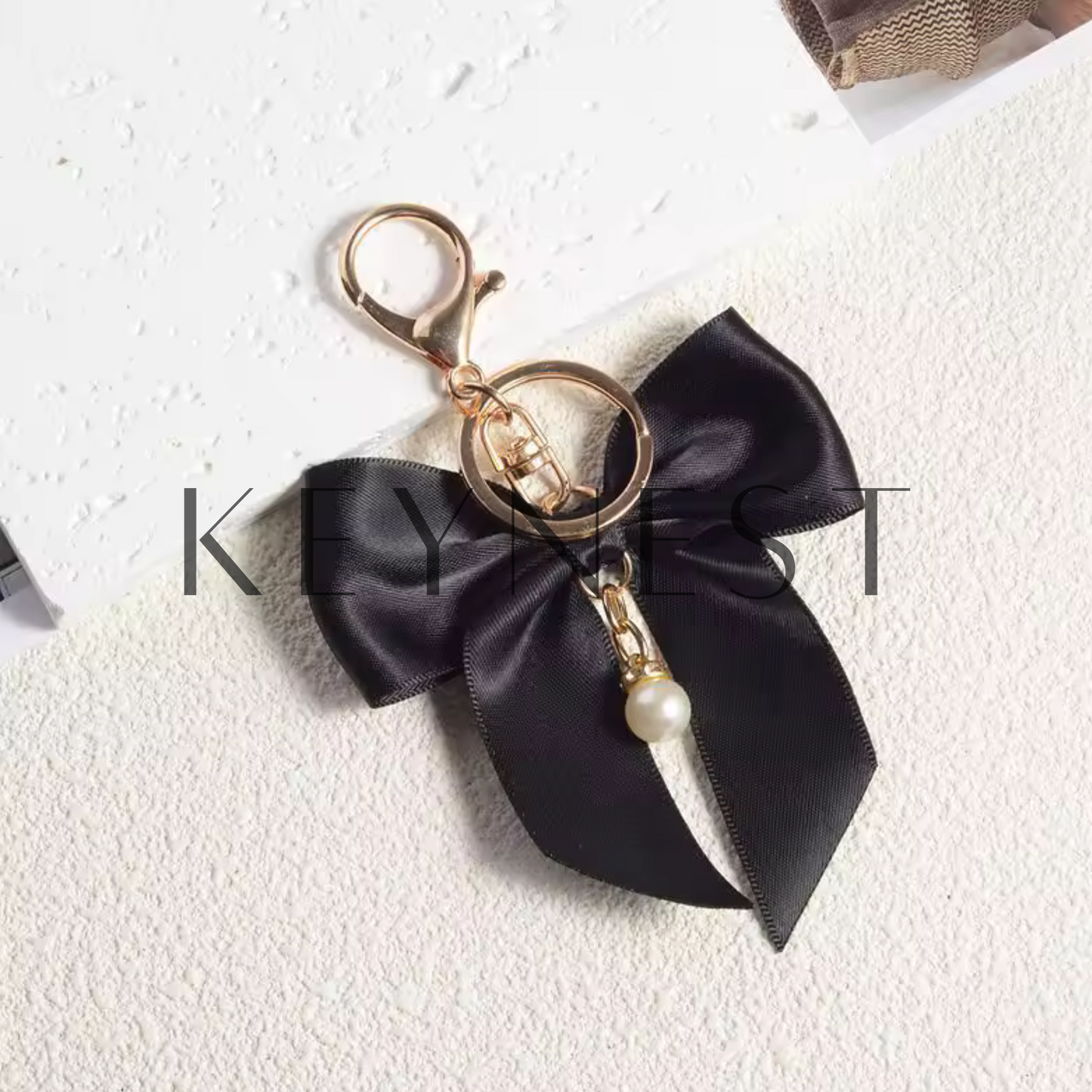 Porte-clé Nœud Élégant – 4 Couleurs Chic au Choix !